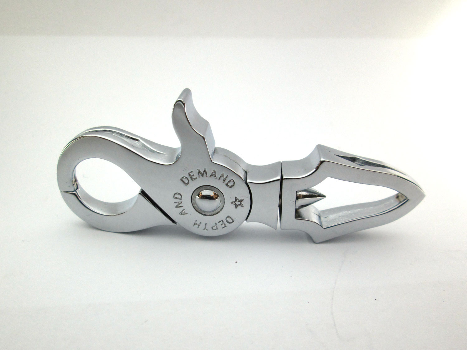 Cast clasp with turned pins featuring sharp details and precise assembly